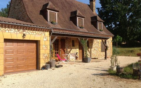 Contemporary four-bedroom house with swimming pool nestled in the hills above a peaceful village in the Périgord Noir.